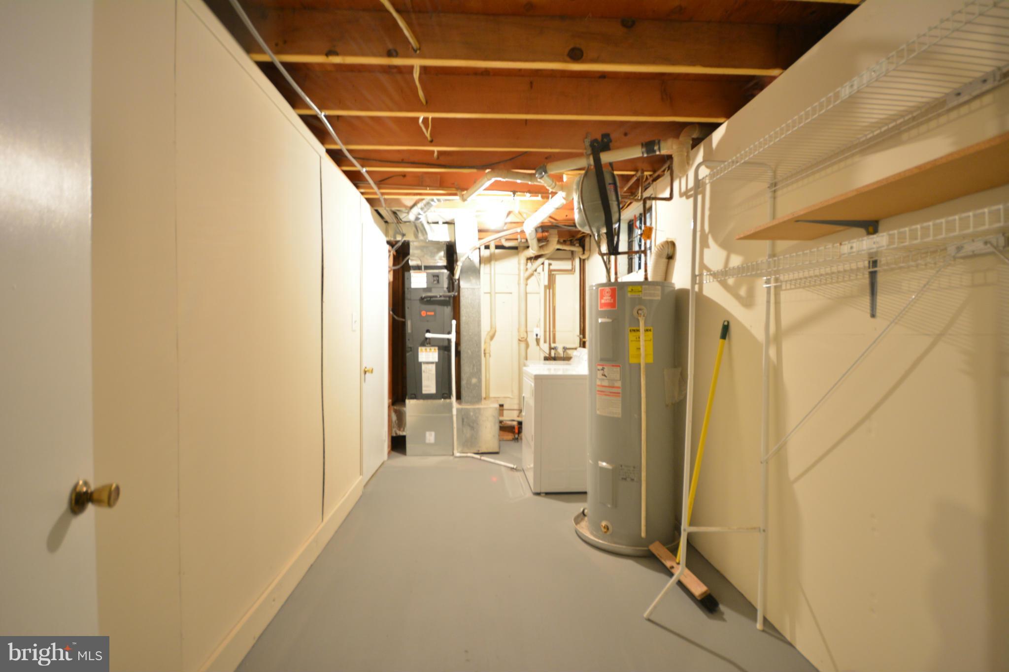 13203 Delaney Road Woodbridge, VA 22193 - Photo 9 of 30 a view of a walk in closet