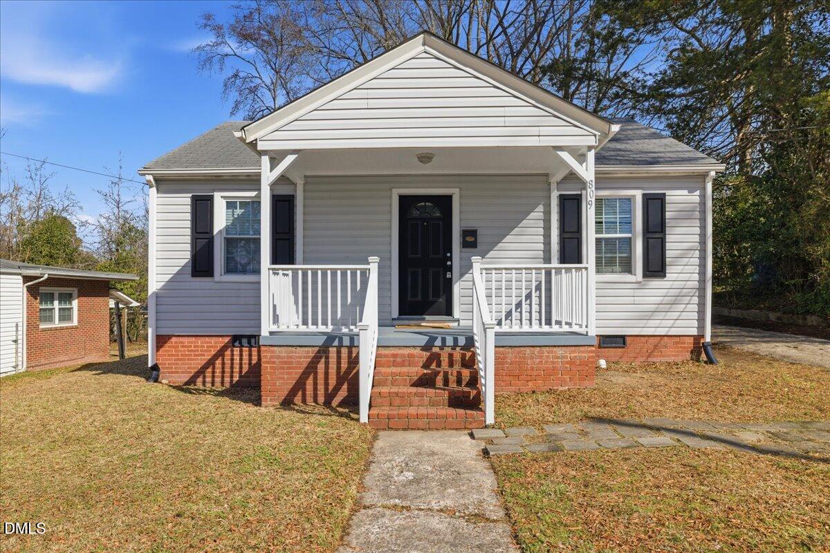 809 Dupree Street Durham, NC 27701 - Photo 1 of 24 front view of a house with a patio