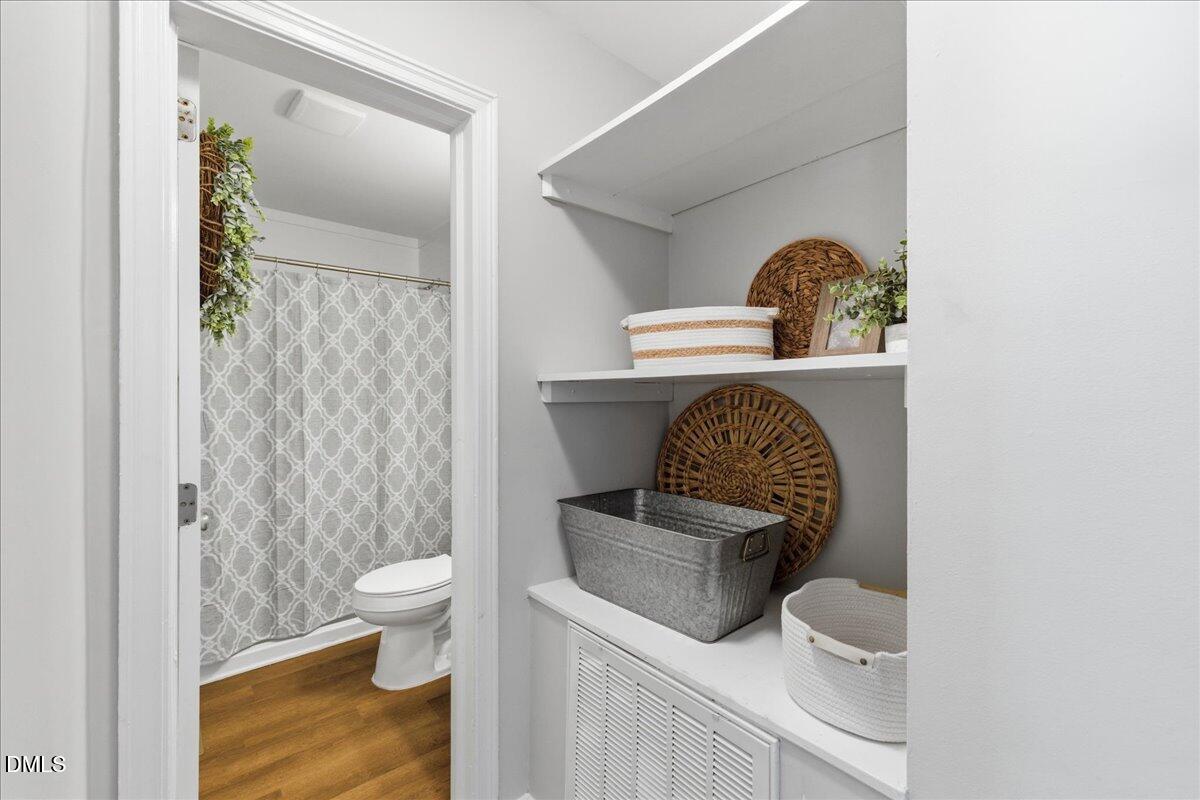 809 Dupree Street Durham, NC 27701 - Photo 14 of 24 a living room with toilet and a sink