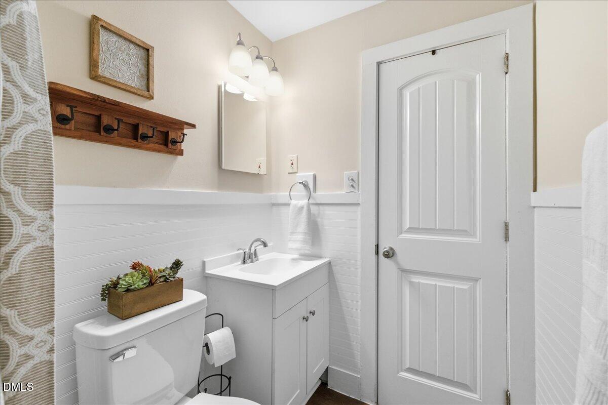 809 Dupree Street Durham, NC 27701 - Photo 16 of 24 a bathroom with a sink and a toilet