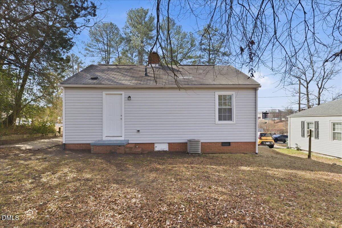 809 Dupree Street Durham, NC 27701 - Photo 22 of 24 a view of a house with a yard and sitting area