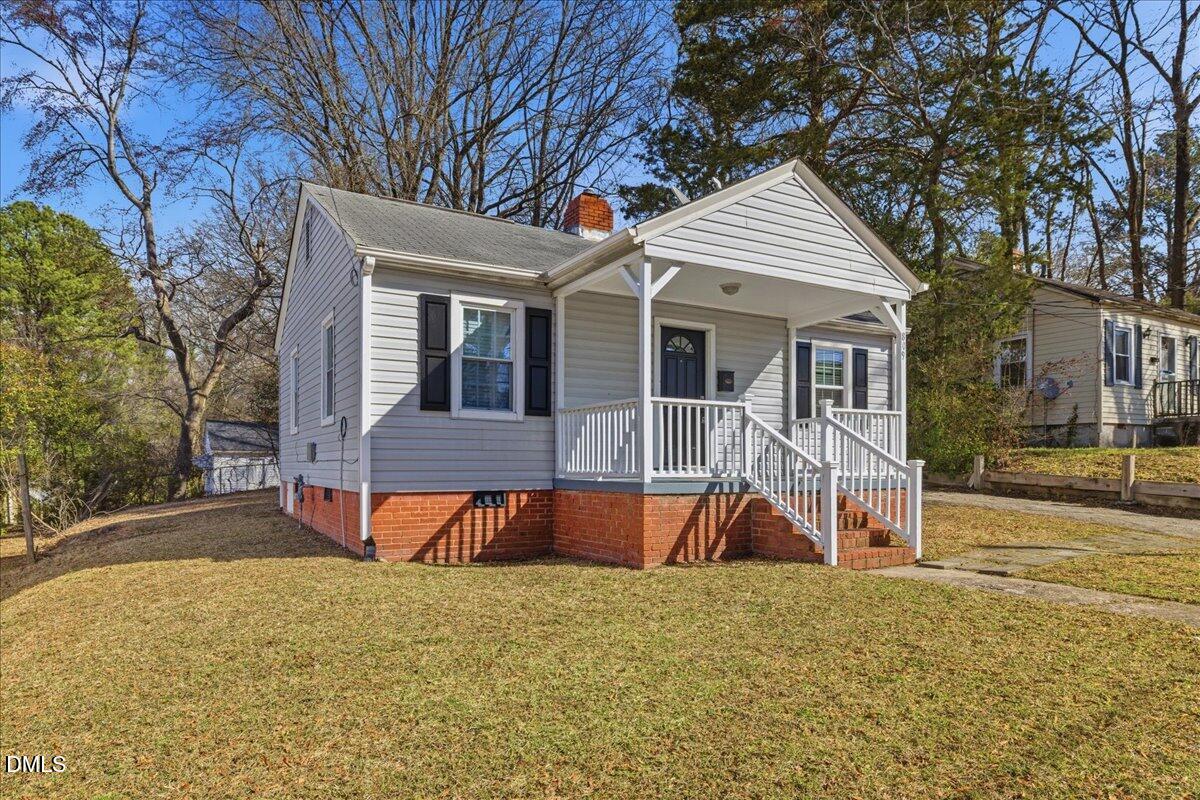 809 Dupree Street Durham, NC 27701 - Photo 6 of 24 front view of a house with a yard