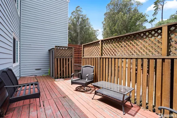 a view of a wooden roof deck