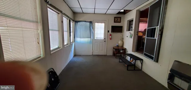 a view of a hallway with workspace