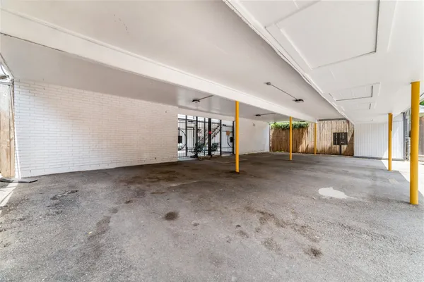a view of a big room with wooden cabinets