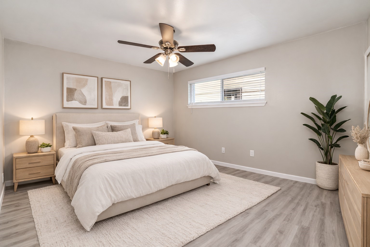 1424 Marshall Street, Unit 9 Houston, TX 77006 - Photo 5 of 17 a bedroom with a large bed and a chandelier