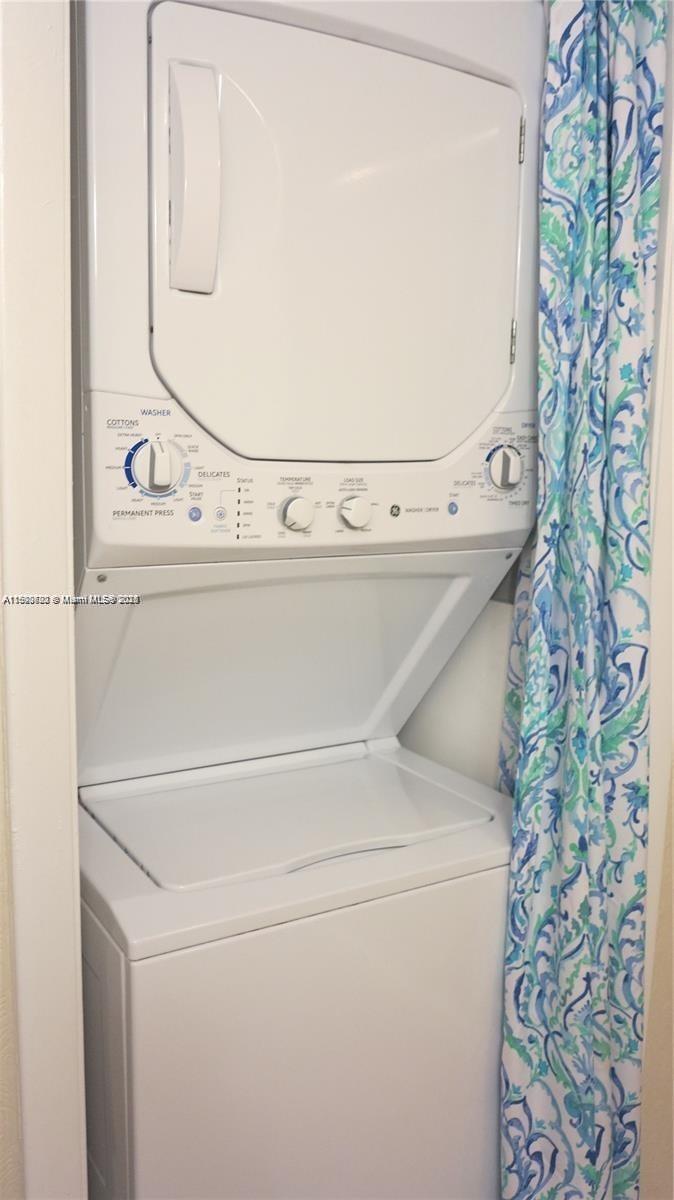 350 Lakeview Drive, Unit 201 Weston, FL 33326 - Photo 10 of 14 a close up view of washer and dryer