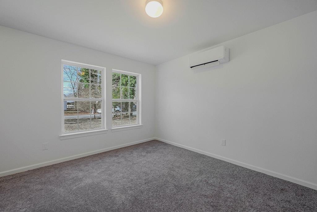New Construction Neighborhood Road Mastic Beach, NY 11951 - Photo 14 of 28 an empty room with a window