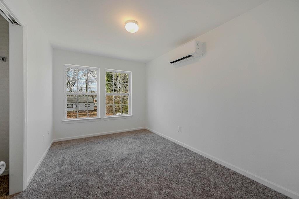 New Construction Neighborhood Road Mastic Beach, NY 11951 - Photo 22 of 28 an empty room with a window