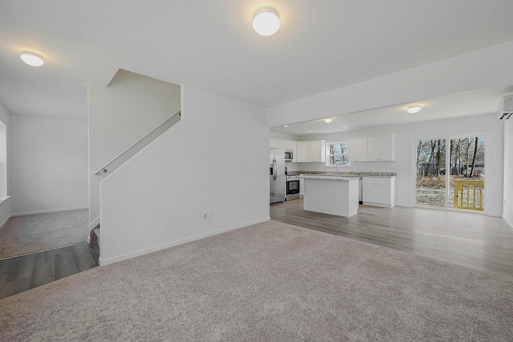 New Construction Neighborhood Road Mastic Beach, NY 11951 - Photo 3 of 28 a view of a kitchen with a sink and cabinets