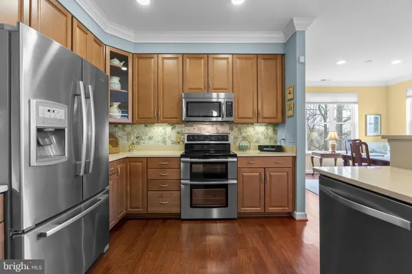 a view of a couches and a table in the patio