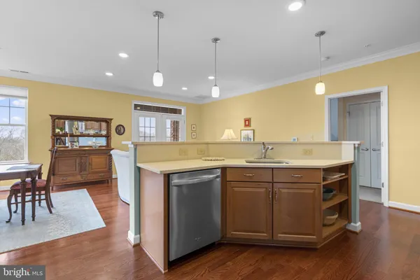 a view of a street with some trees on both side