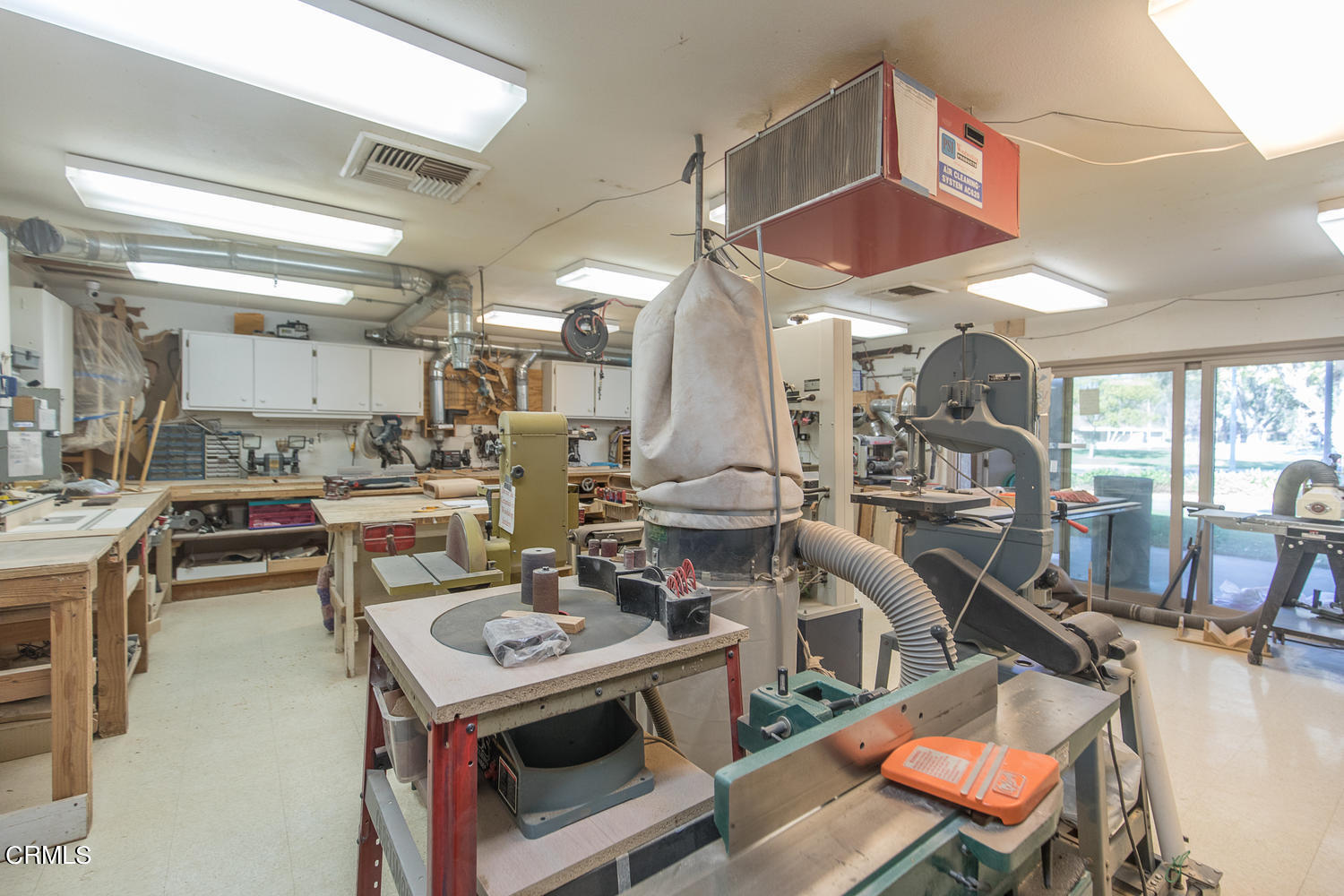 4113 Village 4 Camarillo, CA 93012 - Photo 41 of 50 a kitchen with a stove a table and chairs in it
