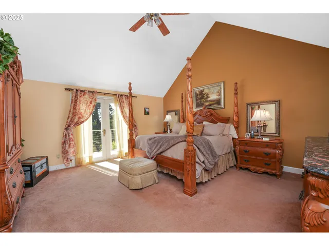 a bedroom with furniture and a window