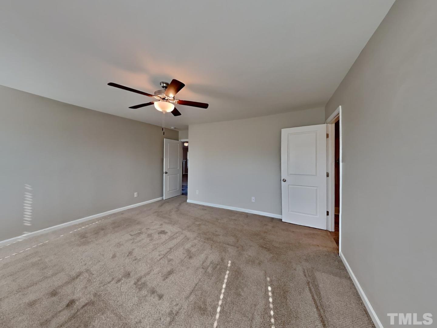113 Cornfield Lane Benson, NC 27504 - Photo 8 of 19 a view of an empty room