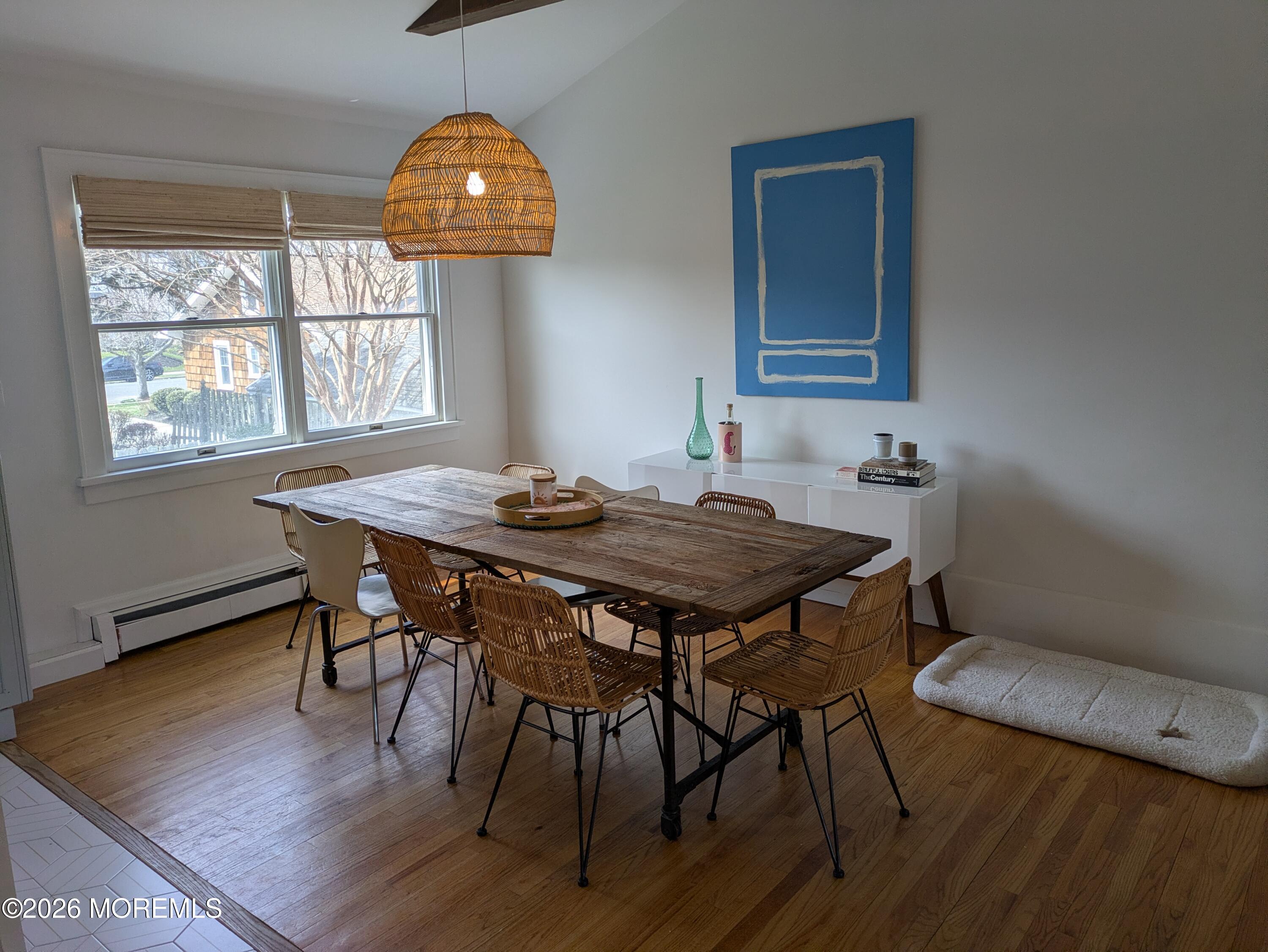 2113 Edgewood Place Spring Lake, NJ 07762 - Photo 2 of 7 a view of a dining table and chairs in a room