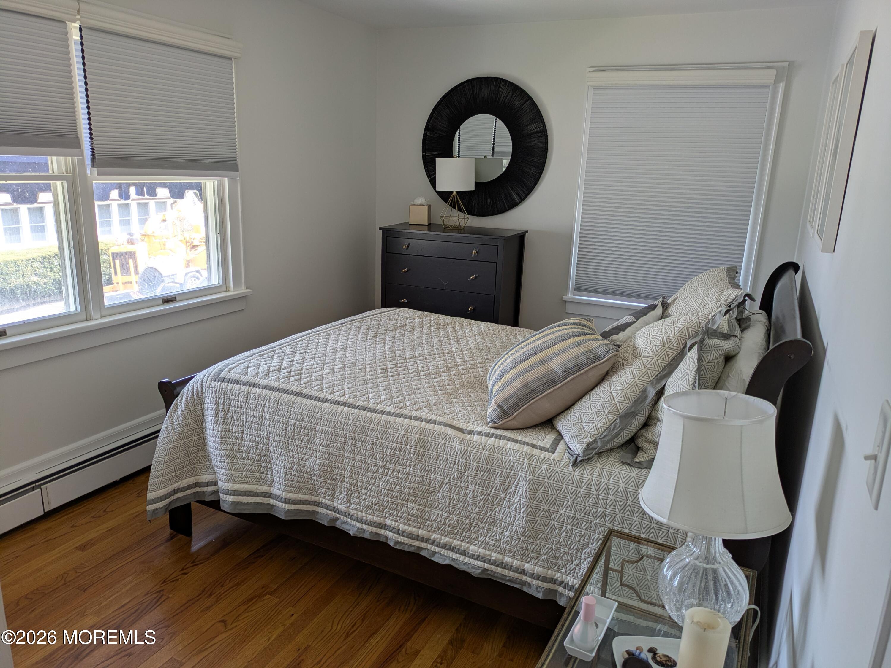 2113 Edgewood Place Spring Lake, NJ 07762 - Photo 4 of 7 a bedroom with a bed and a window