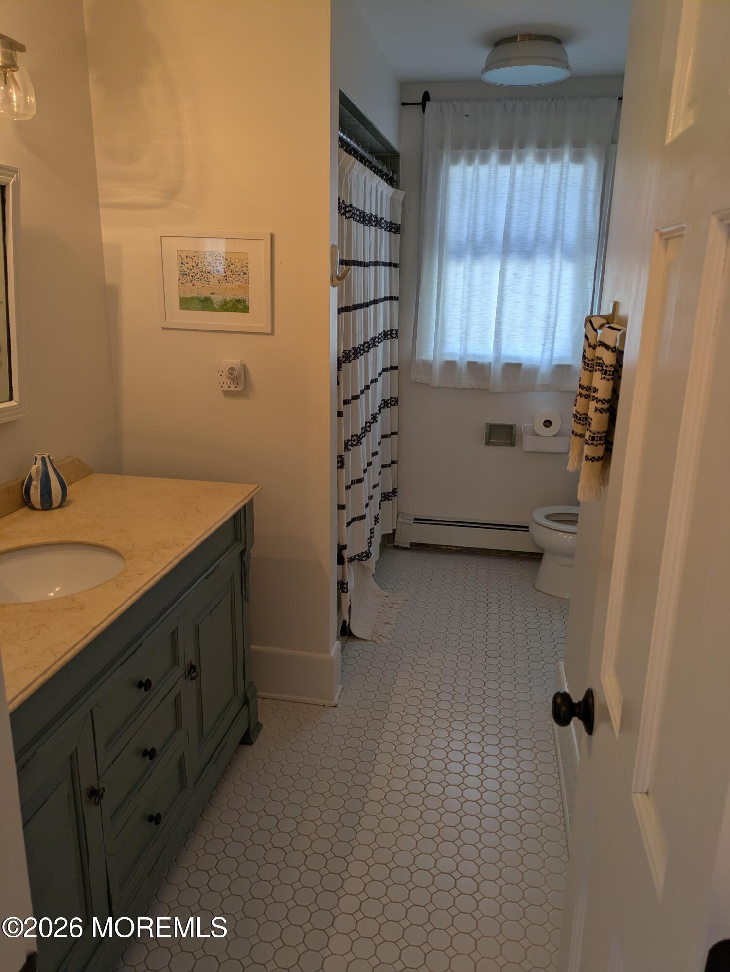 2113 Edgewood Place Spring Lake, NJ 07762 - Photo 6 of 7 a bathroom with a sink and a shower