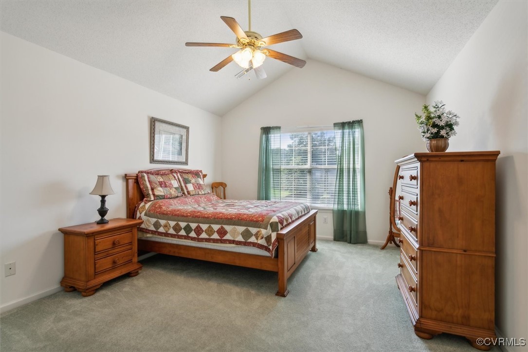 2104 Westgate Circle Williamsburg, VA 23185 - Photo 13 of 45 a bedroom with a bed dresser and a window