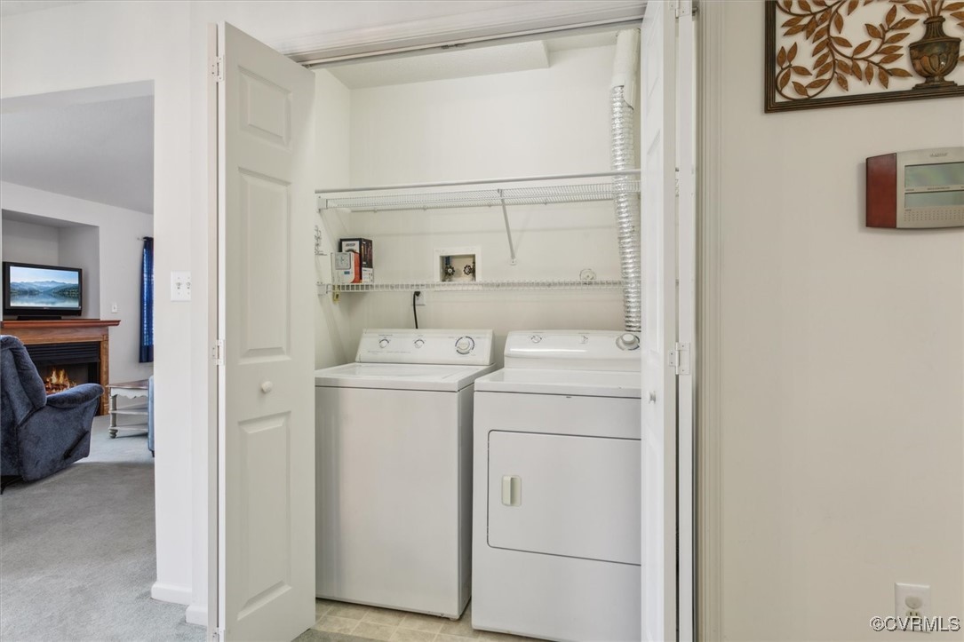 2104 Westgate Circle Williamsburg, VA 23185 - Photo 20 of 45 a view of storage and utility room with washer and dryer