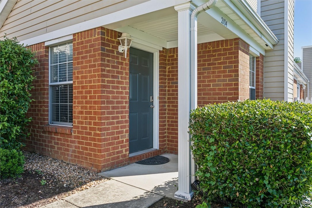 2104 Westgate Circle Williamsburg, VA 23185 - Photo 2 of 45 a view of house with brick walls