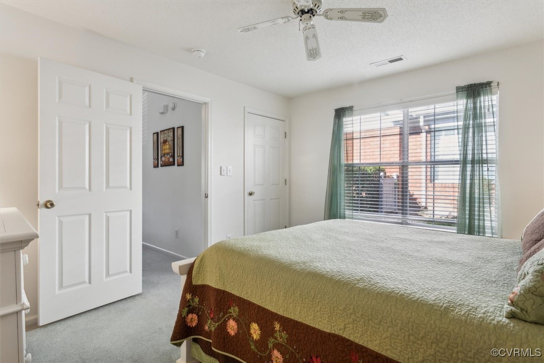 2104 Westgate Circle Williamsburg, VA 23185 - Photo 24 of 45 a bedroom with a bed and a window