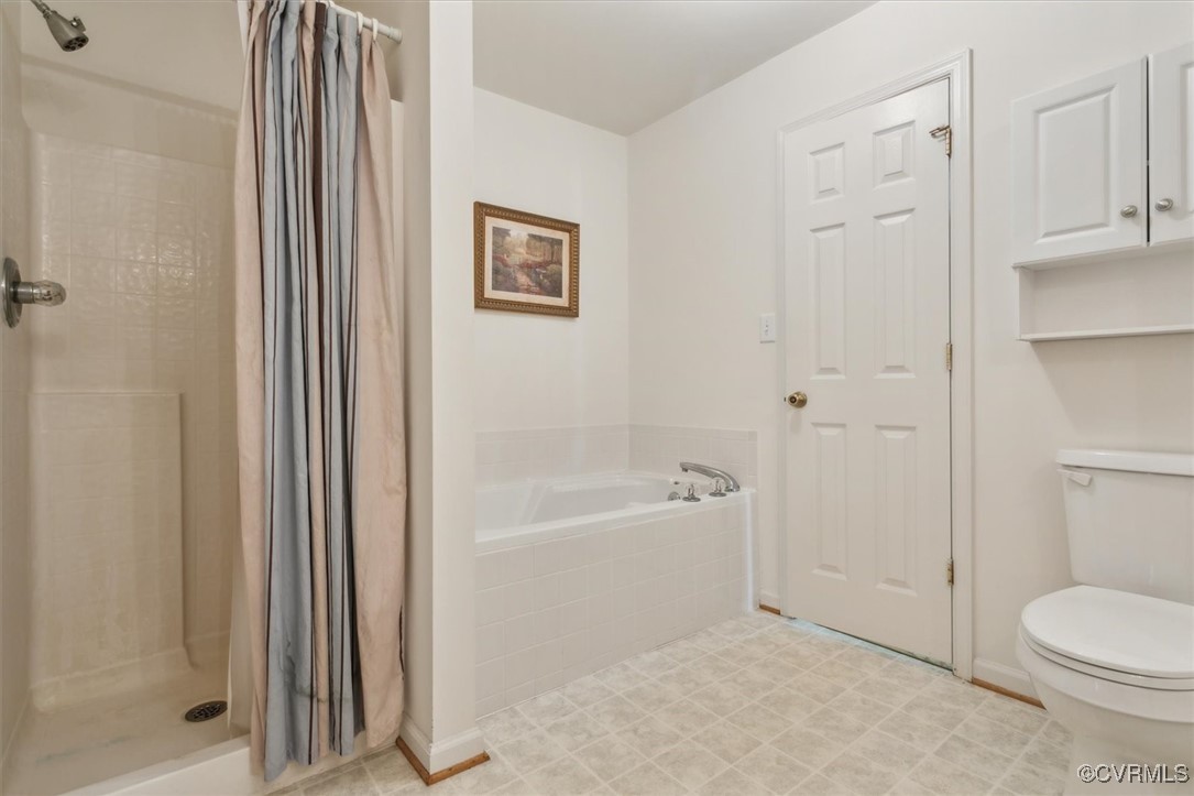 2104 Westgate Circle Williamsburg, VA 23185 - Photo 27 of 45 a bathroom with a bathtub and a shower