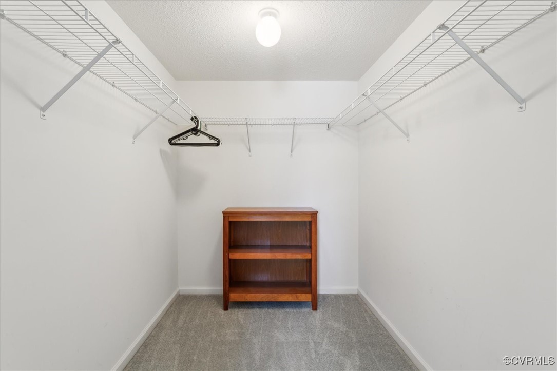 2104 Westgate Circle Williamsburg, VA 23185 - Photo 33 of 45 a room with a bench and a stove