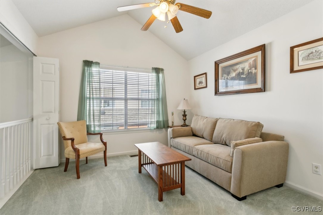 2104 Westgate Circle Williamsburg, VA 23185 - Photo 36 of 45 a living room with furniture and a large window