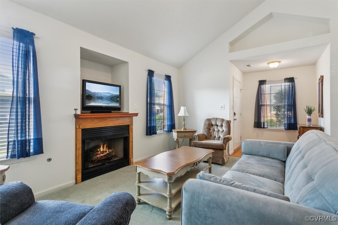 2104 Westgate Circle Williamsburg, VA 23185 - Photo 6 of 45 a living room with furniture and a fireplace