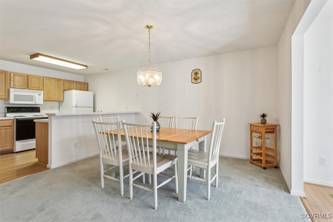 2104 Westgate Circle Williamsburg, VA 23185 - Photo 7 of 45 a view of a dining room with furniture