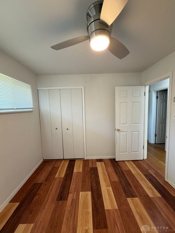 4924 Bayside Drive Riverside, OH 45431 - Photo 13 of 21 This inviting bedroom features rich hardwood flooring, creating a cozy and warm living space.