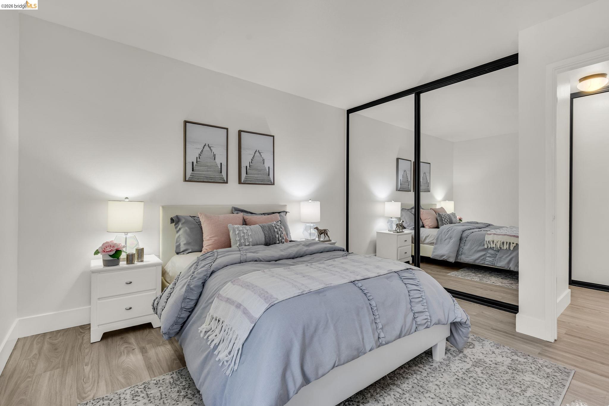 2632 Warring Street, Unit 3 Berkeley, CA 94704 - Photo 16 of 23 a bedroom with a bed and a large window