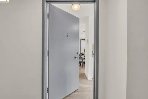 a view of a bathroom from the hallway