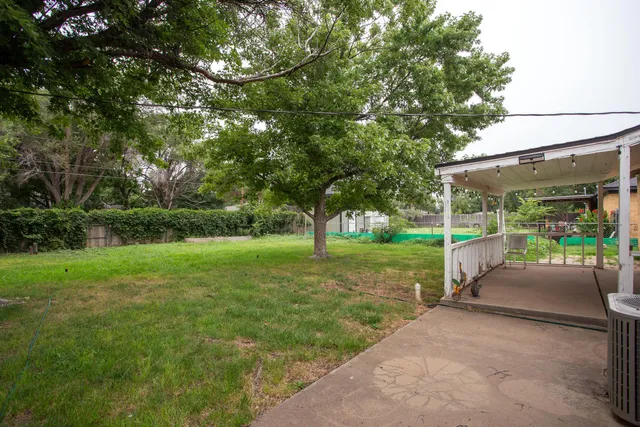 a view of a patio with backyard