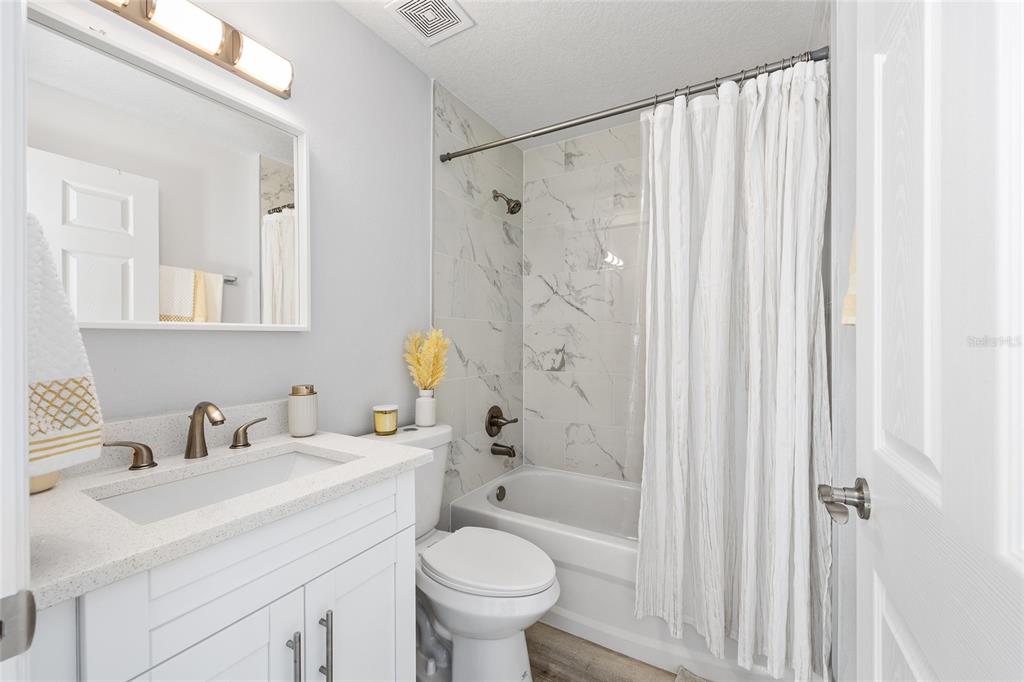 3597 Southwest 151st Avenue Ocala, FL 34481 - Photo 24 of 35 a bathroom with a sink toilet and shower