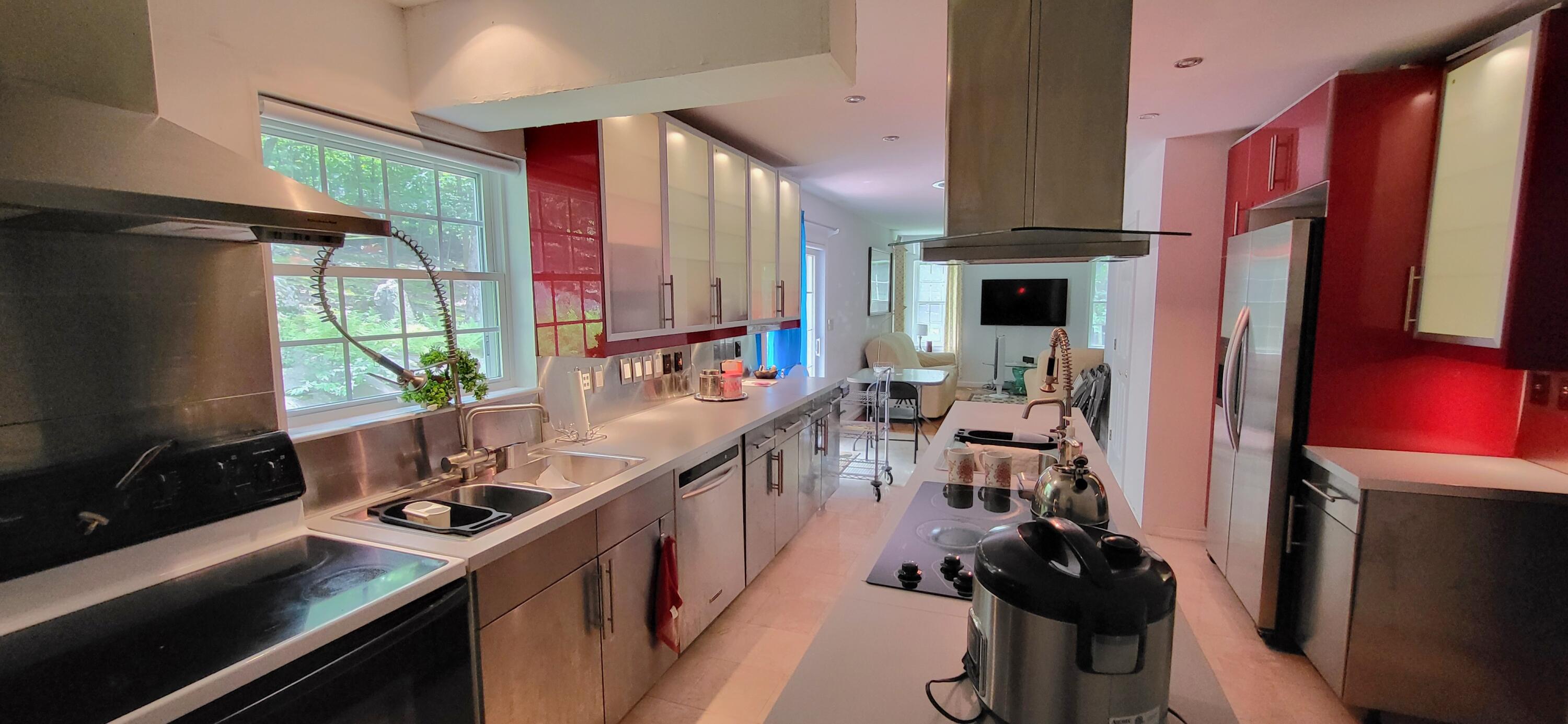 6251 Decker Road Bushkill, PA 18324 - Photo 14 of 58 a kitchen with stainless steel appliances a sink stove and refrigerator
