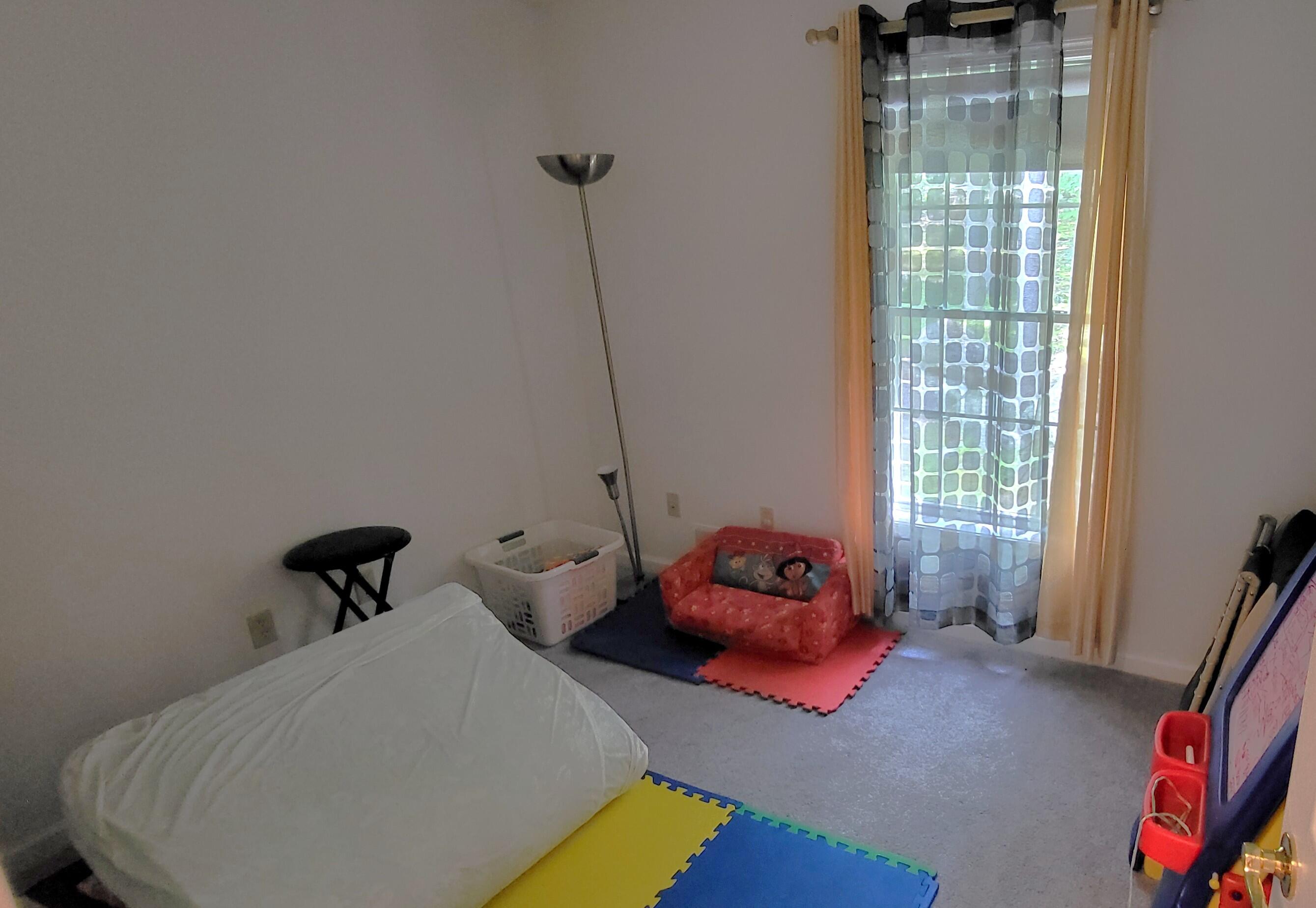 6251 Decker Road Bushkill, PA 18324 - Photo 17 of 58 a bedroom with a bed and window