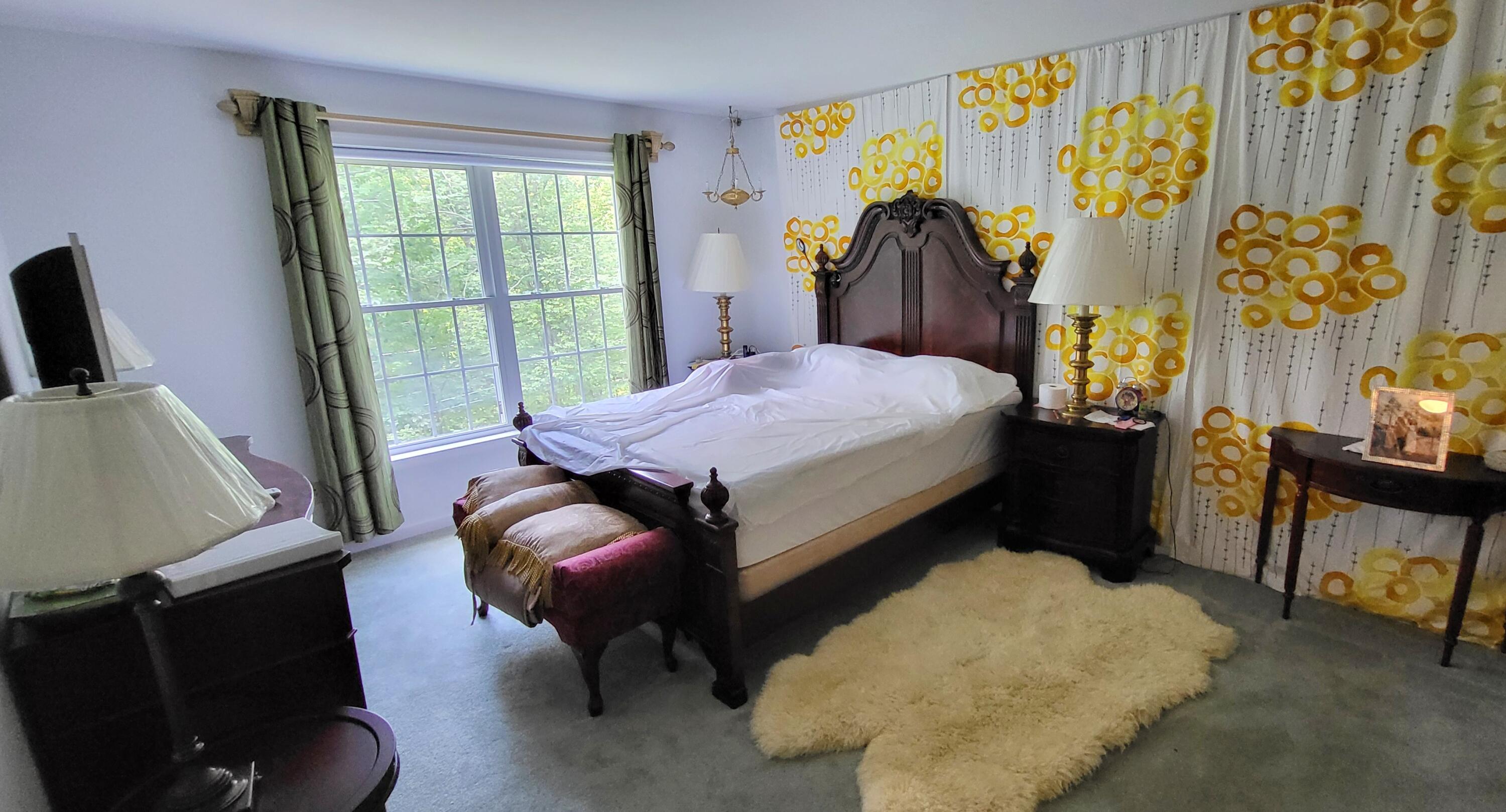 6251 Decker Road Bushkill, PA 18324 - Photo 21 of 58 a bedroom with a bed and wooden floor