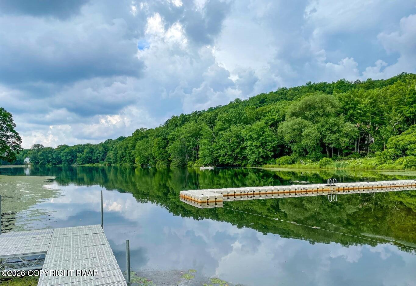 6251 Decker Road Bushkill, PA 18324 - Photo 42 of 58 a view of a garden with a fountain