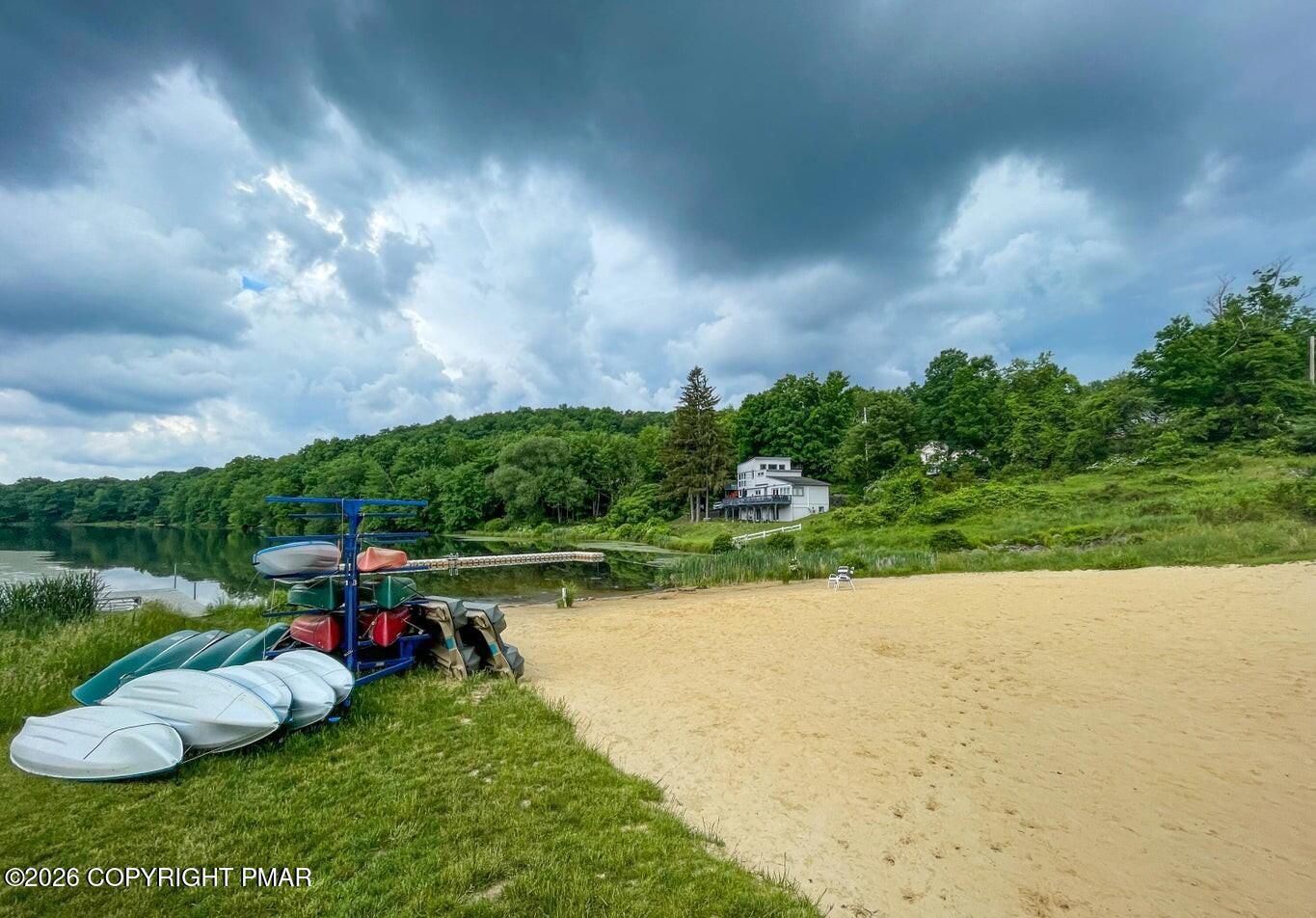 6251 Decker Road Bushkill, PA 18324 - Photo 47 of 58 a view of swimming pool and lake view