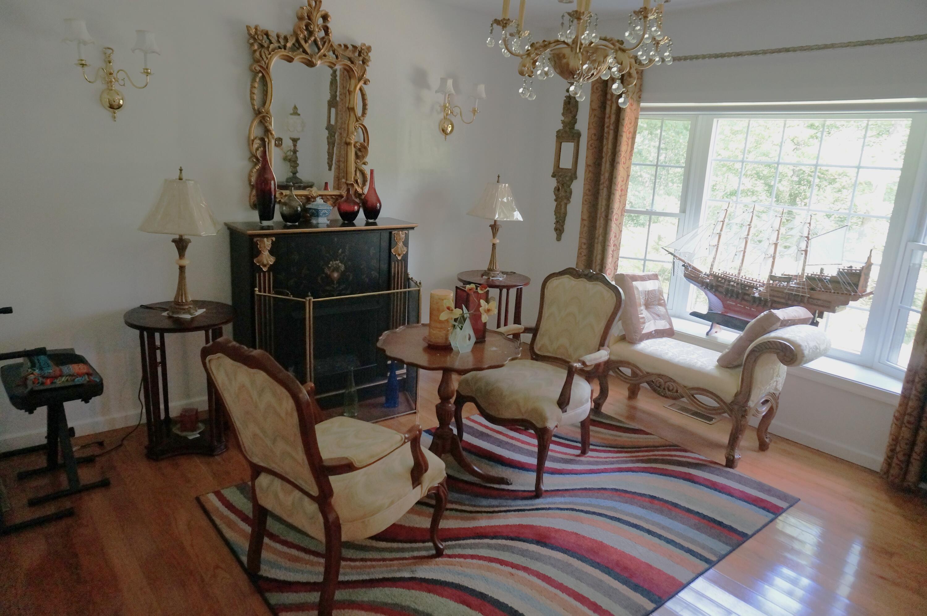 6251 Decker Road Bushkill, PA 18324 - Photo 8 of 58 a dining room with furniture and wooden floor