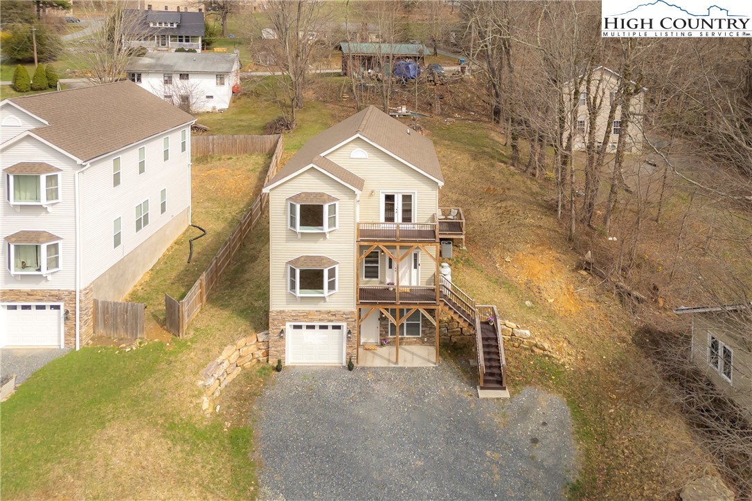 262 Old Bristol Road Boone, NC 28607 - Photo 38 of 38 a aerial view of a house with a yard