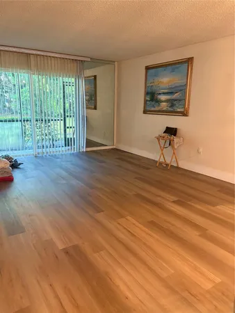 a view of a livingroom with a flat screen tv