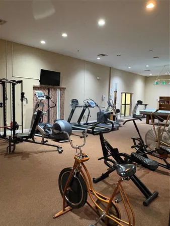 a view of a room with gym equipment