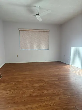 a view of an ocean & window in a room