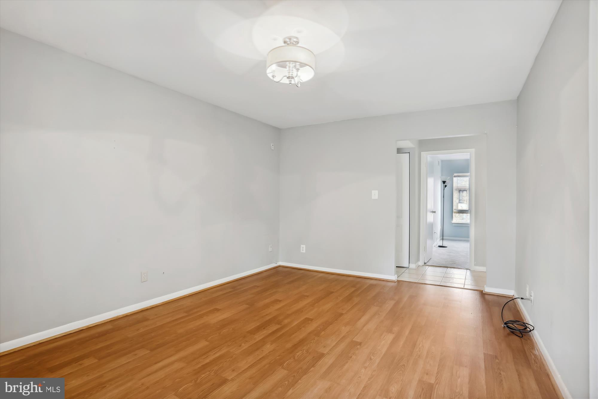 2240 Castle Rock Square, Unit 22C Reston, VA 20191 - Photo 11 of 28 Living area across from bedroom front exposure