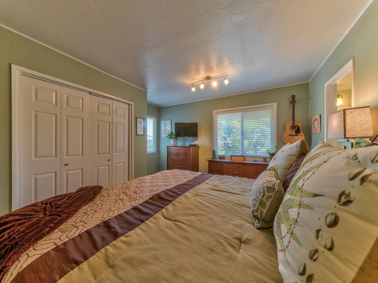 14 Vista Drive Prunedale, CA 93907 - Photo 13 of 31 a bedroom with a large bed and a window