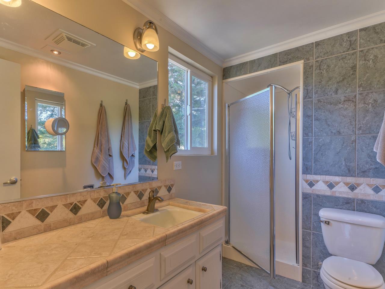 14 Vista Drive Prunedale, CA 93907 - Photo 14 of 31 a bathroom with a granite countertop sink toilet and shower