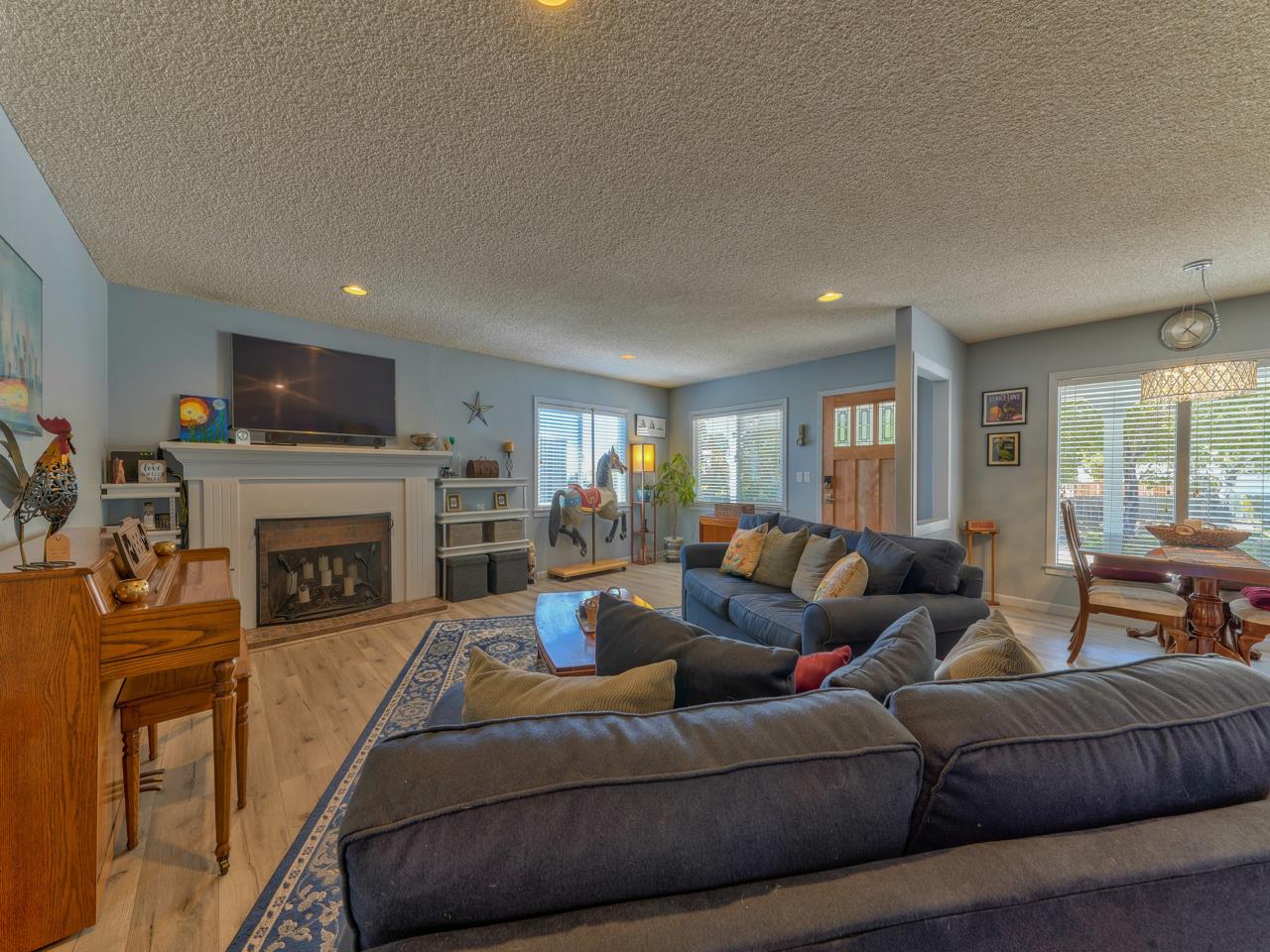 14 Vista Drive Prunedale, CA 93907 - Photo 3 of 31 a living room with fireplace furniture and a window